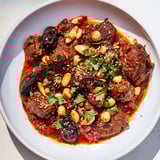 Tender lamb tagine, beautifully stewed with prunes and almonds, is a hearty Moroccan delight.