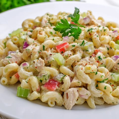 Chicken Macaroni Holiday Salad, a creamy, cold salad with visible macaroni and chicken pieces.