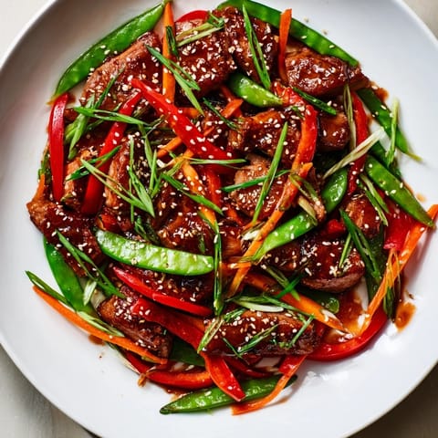 Vibrant Sweet Teriyaki Pork Stir-Fry with colorful vegetables and a sweet, savory sauce, ready to serve.