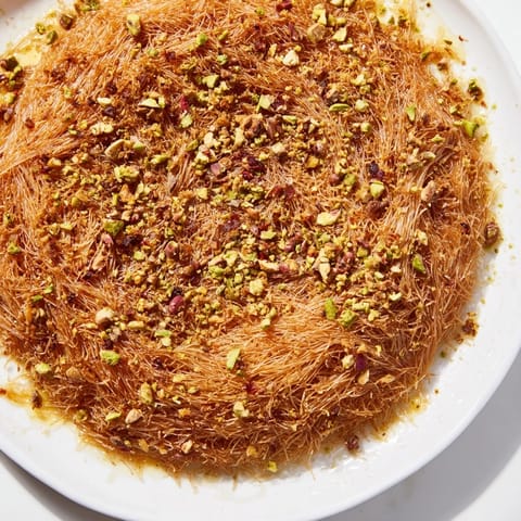 Crispy layers and a sweet syrup make this Egyptian Konafa an irresistible treat.