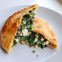Golden Turkish Spinach & Feta Flatbread, sizzling from the pan, ready for a warm bite.